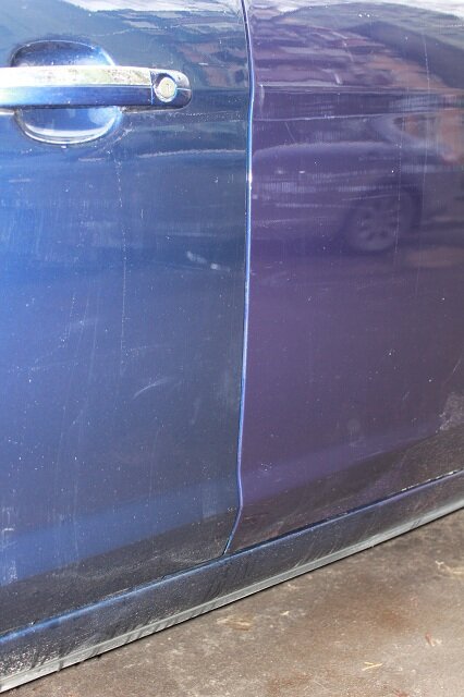 Перекрашенная задняя дверь 