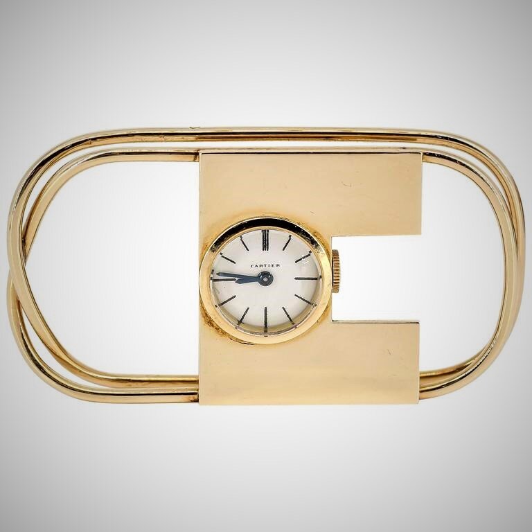 Cartier, зажим для денег + часы, золото, горячая эмаль,1940-е. Аукционный дом Christie"s, официальный сайт - www.christies.com
