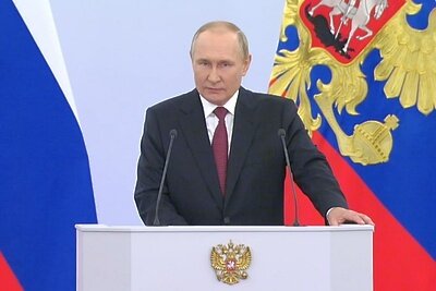    Владимир Путин на церемонии подписания договоров о вхождении новых территорий в состав России ©Скриншот