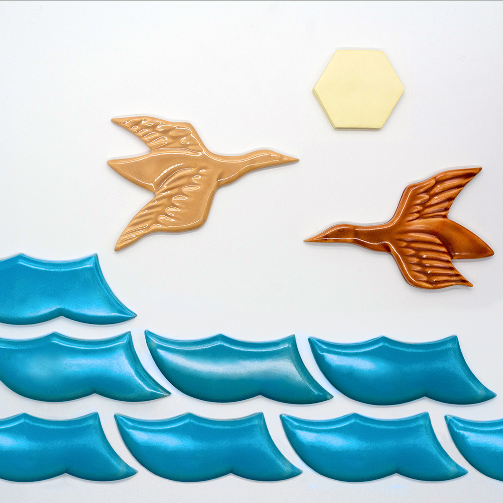 На фотографии плитки из коллекций "Волна", "Птица" и "Шестиугольник".