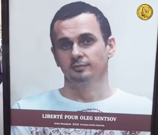 Плакат в Париже источник Ютуб