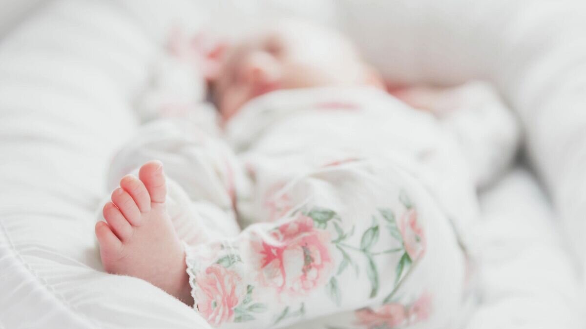    Младенец спит в кроватке© Фото : Unsplash/Tuva Mathilde Løland