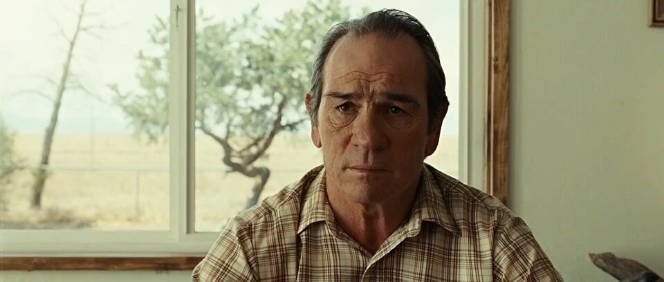 Шериф Эд Том Белл (Ed Tom Bell) в исполнении Томми Ли Джонса в фильме "Старикам тут не место".