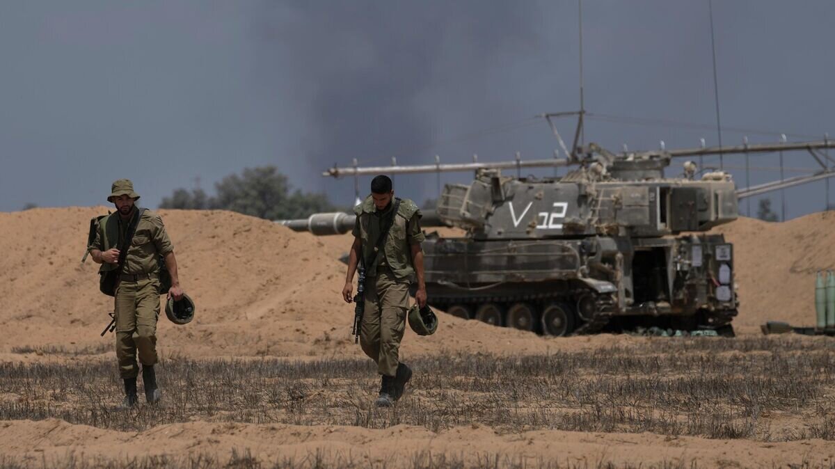    Израильские военные на границе с сектором Газа© AP Photo / Ariel Schalit