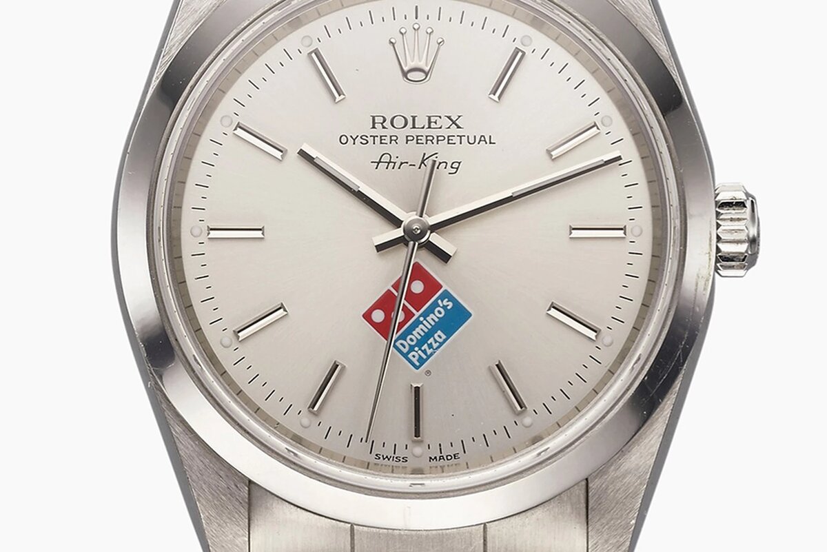 Герой сегодняшней публикации - официальные Rolex Domino's Pizza, которые могут поведать очень интересную историю