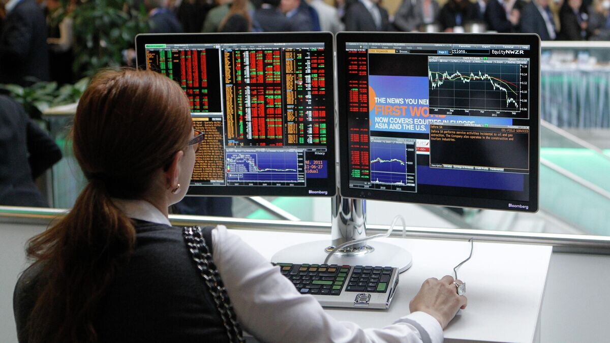    Участница Инвестиционного форума в Центре международной торговли в Москве© РИА Новости / Алексей Куденко