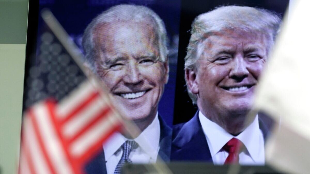    Репортаж о выборах в США © AP Photo / Eugene Hoshiko