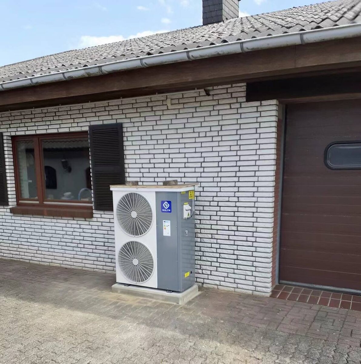 На фото тепловой насос NewEnergy