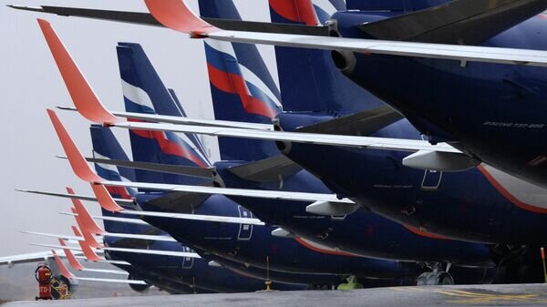    Пассажирские самолеты Boeing 737-800 авиакомпании "Аэрофлот" в аэропорту "Красноярск"© РИА Новости / Илья Наймушин