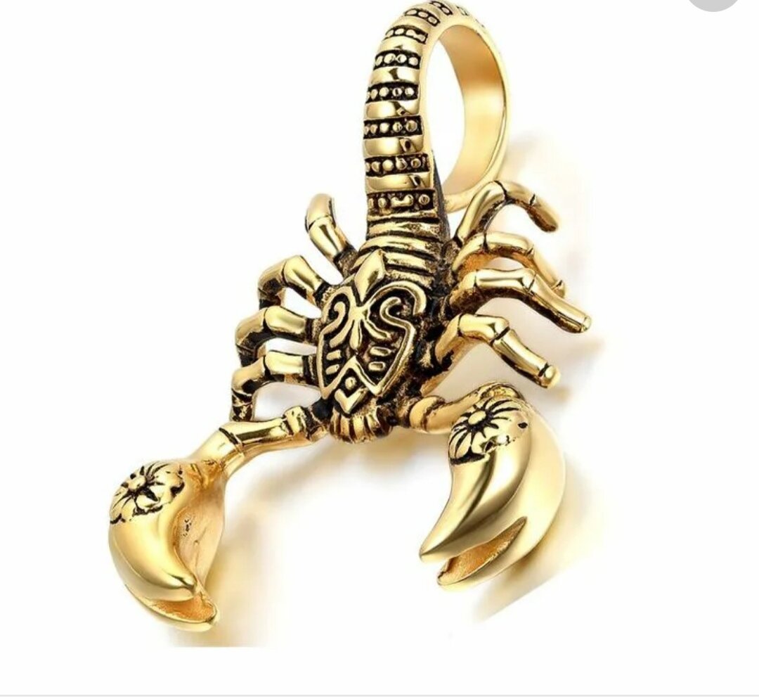 Скорпион из золота