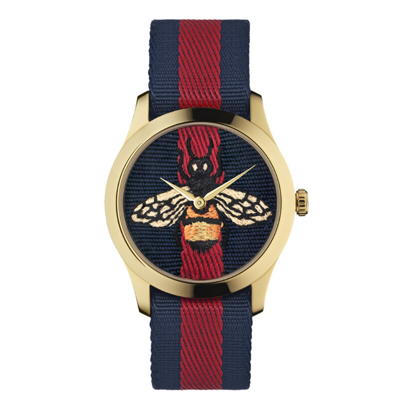 Часы Gucci G-Timeless с 38 мм корпусом из стали с PVD-покрытием, кварцевым механизмом, тканевыми циферблатом и ремешком
