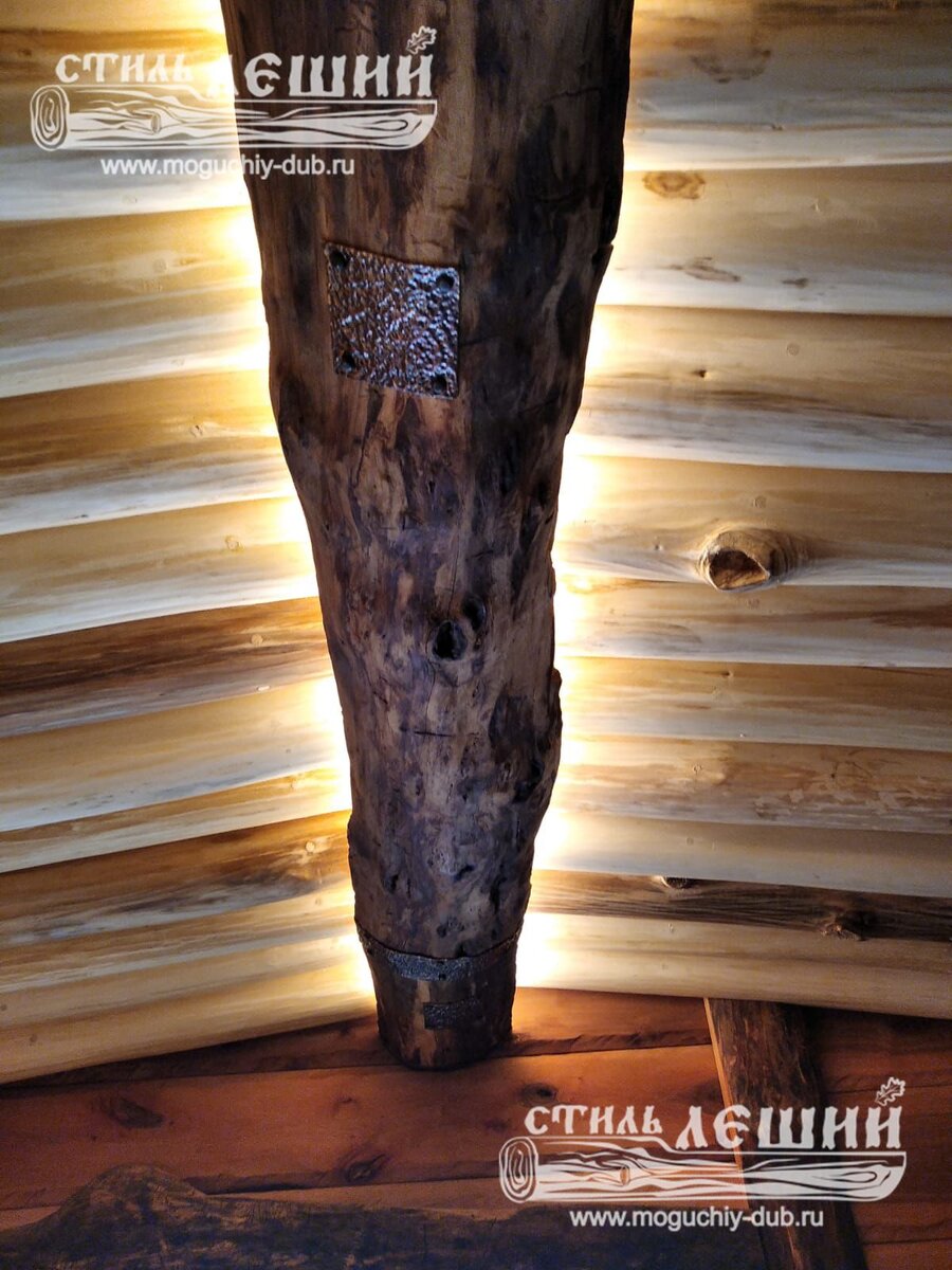 Медные заплатки на полубревне ясень
