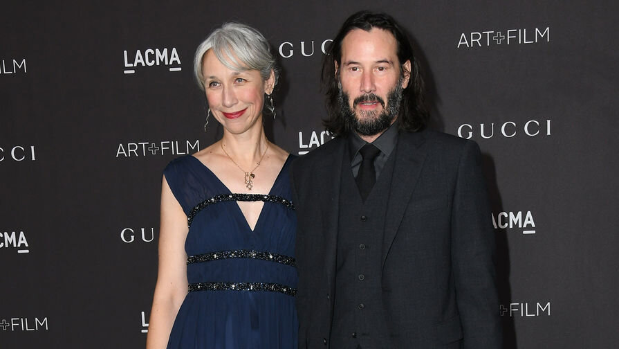 Александра Грант и Киану Ривз.