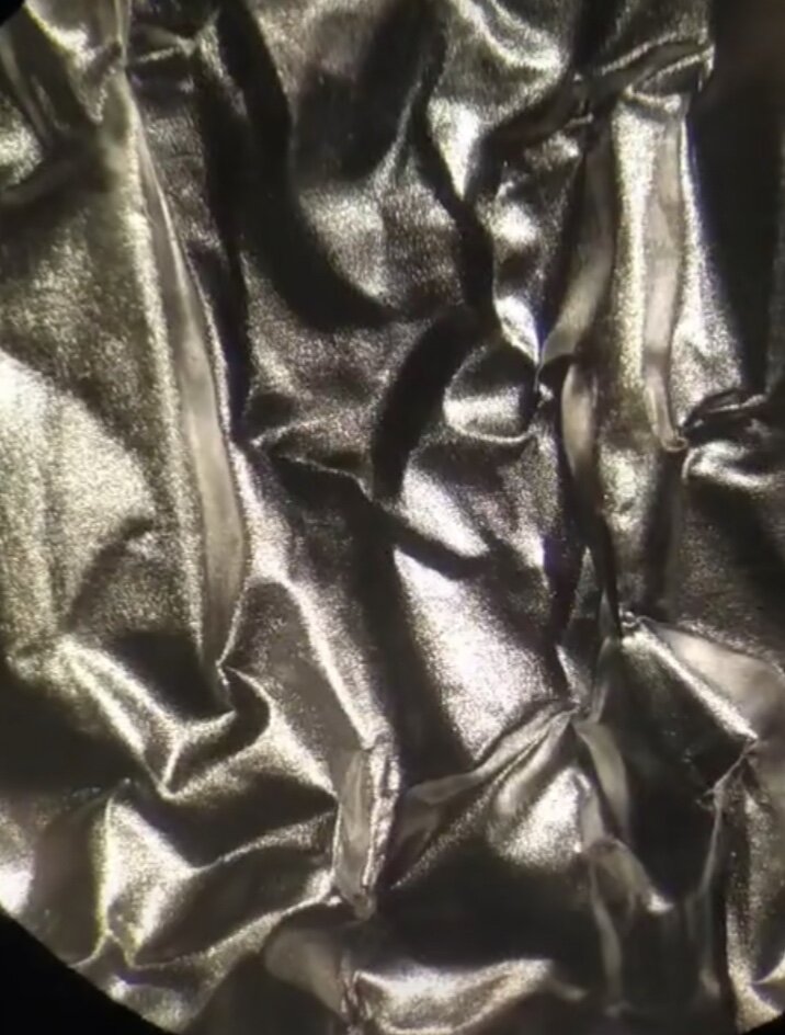 Зеркало под микроскопом 