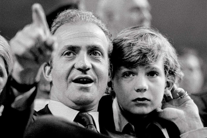 © Фото: Daniel Gluckman / Getty Images Хуан Карлос и его сын Филипп