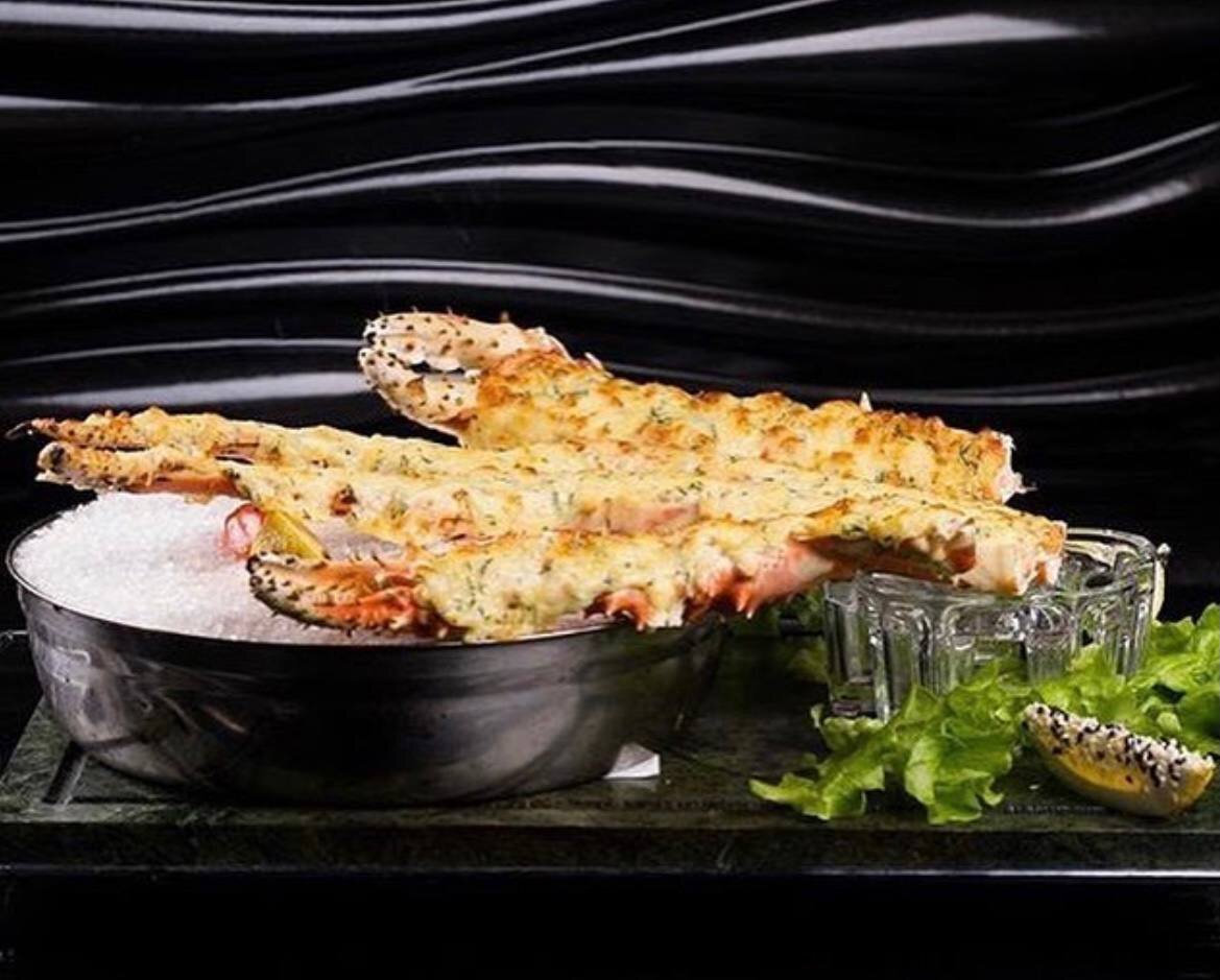 Клешни краба запечённые в сырном соусе