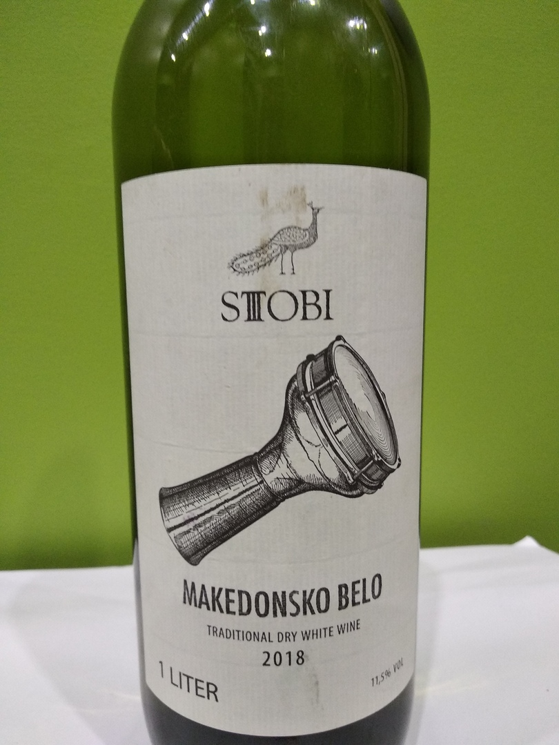 Вино stobi. Вино Stobi македонское белое сухое 1л. Вино македонское красное полусухое 1 л. Македонское белое вино 1 литр. Стоби вино Македония белое.