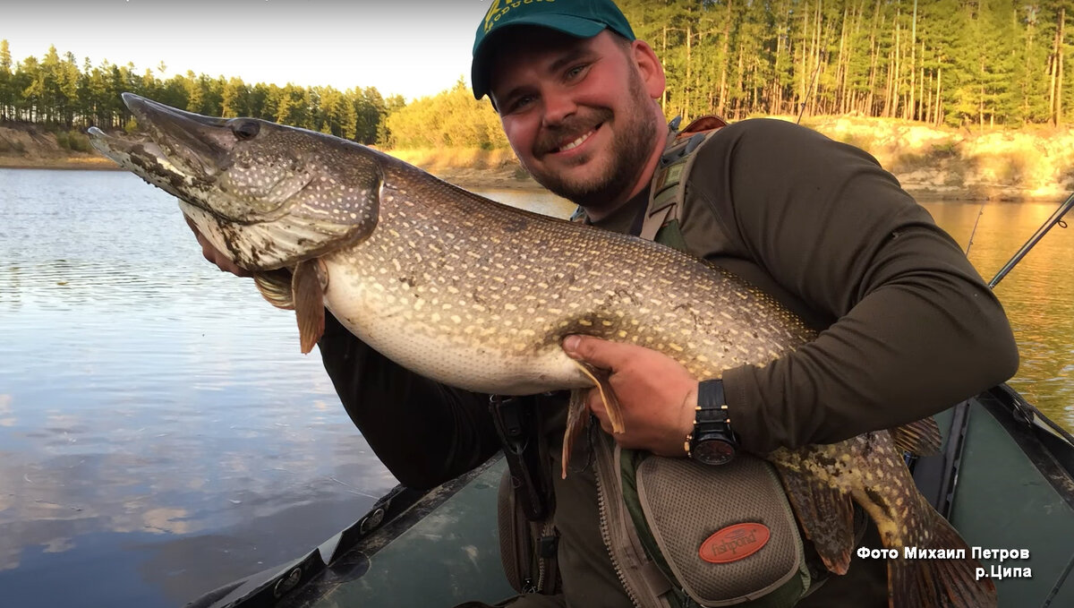 Михаил, друг мой, с трофейной щукой в 10 кг. 