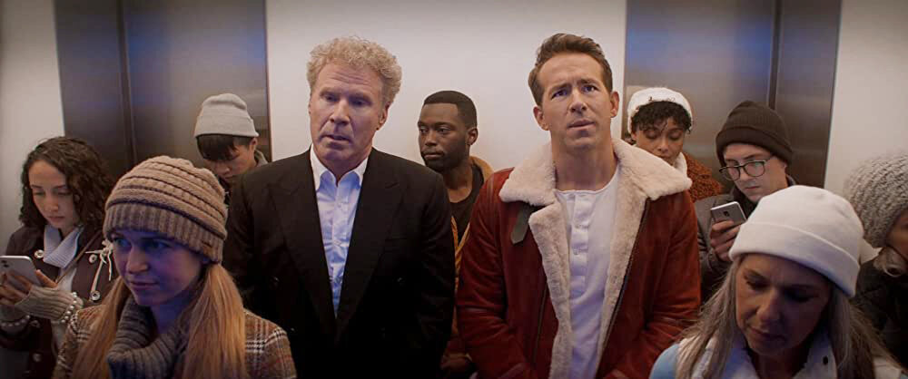 Уилл Феррелл и Райан Рейнольдс в фильме «В духе Рождества»