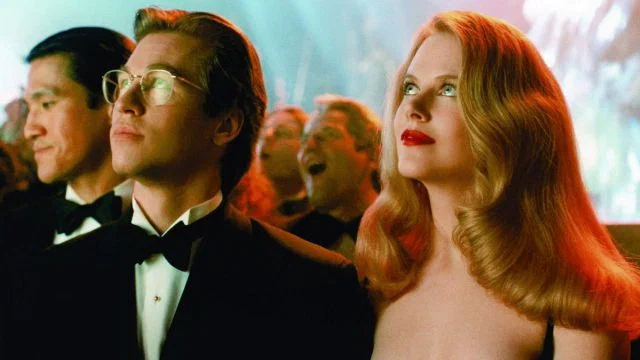 Брюс Уэйн и доктор Чейс Меридиан  из "Бэтмен навсегда"