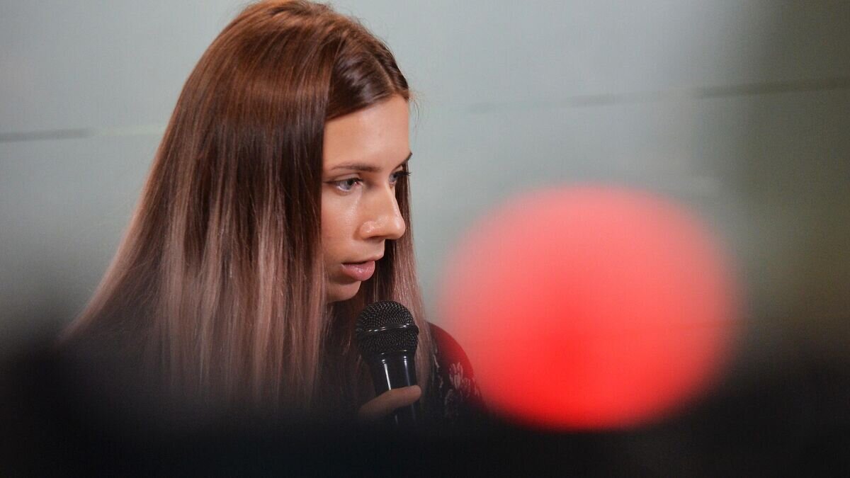    Белорусская легкоатлетка Кристина Тимановская во время пресс-конференции в Варшаве.© РИА Новости / Лех Сохацки