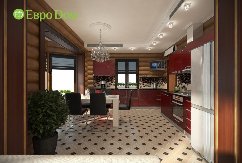  На фото: Дизайн красной кухни в загородном доме