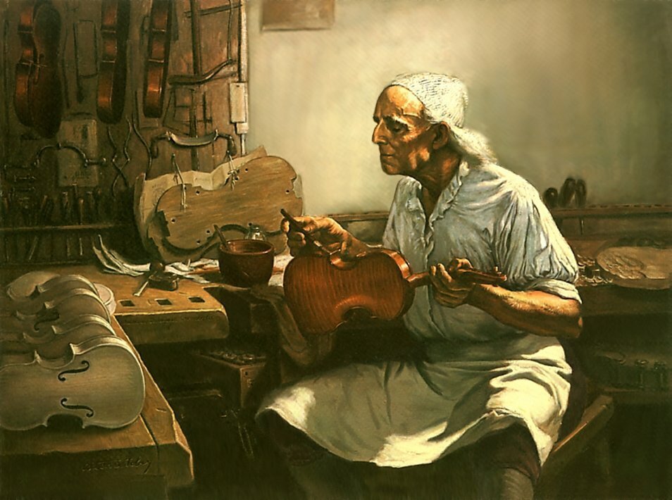 На фото скрипичных дел мастер.