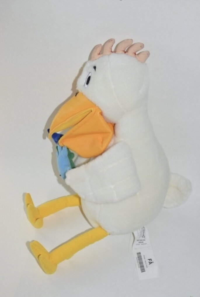 у игрушки также выцвел хохолок а этикетка цела