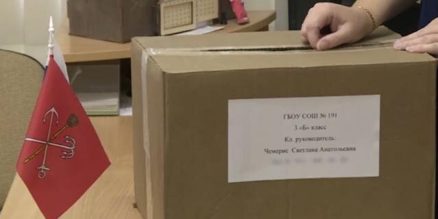    В Красногвардейском районе запустили акцию "Посылка солдату".Скриншот видео телеканала "Санкт-Петербург".