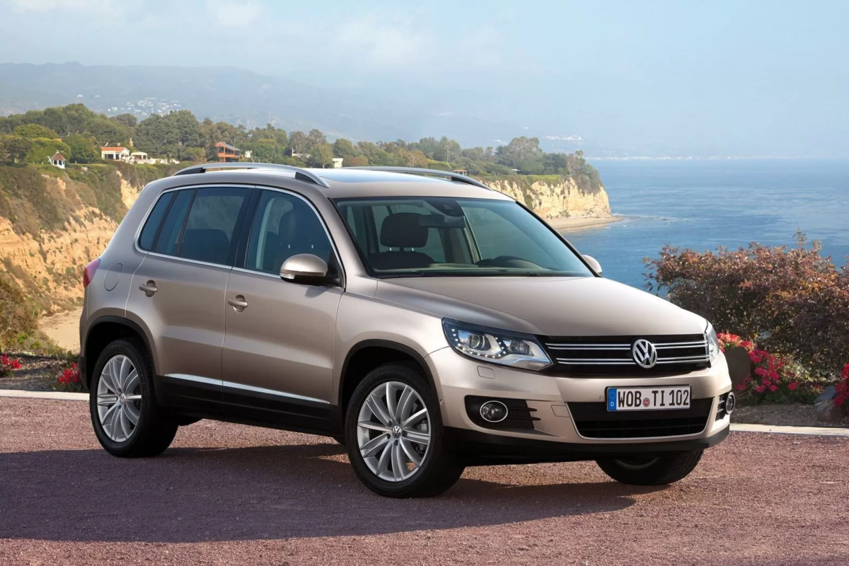 Tiguan 1.5. Volkswagen Tiguan i. Тигуан 2006. Фольксваген Тигуан 2006. Кроссовер Фольксваген Тигуан.