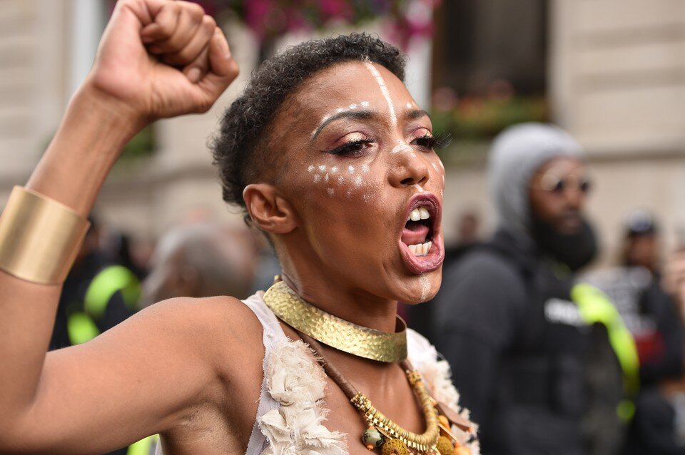     Призыв борцы за равноправие темнокожих американцев приурочили к Дню уважения к сотрудникам правопорядка в США.  GLOBAL LOOK PRESS