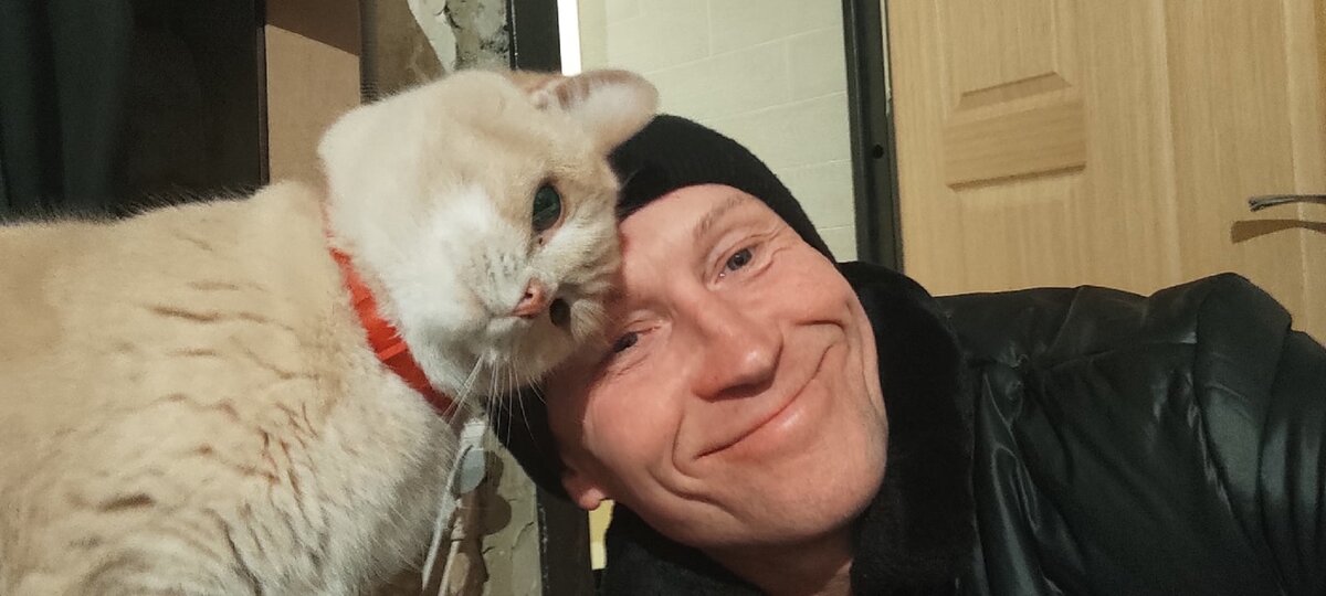 Федор Фирсов и его "музейный кот" Сэм