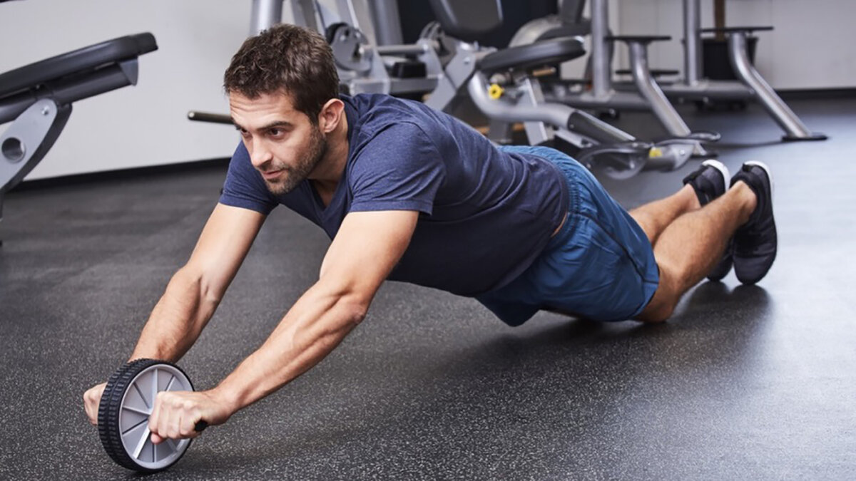 Спортивное колесо. Колесо для пресса. Упражнения с колесом. Пресс с колесом. Колесо для тренировки пресса.
