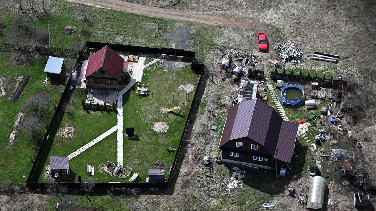    Дома в Московской области© РИА Новости / Павел Бедняков