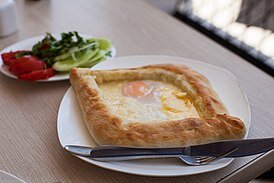 Хачапу́ри (груз. ხაჭაპური) — блюдо грузинской кухни, грузинское национальное мучное изделие, представляющее собой лепёшку с сыром.