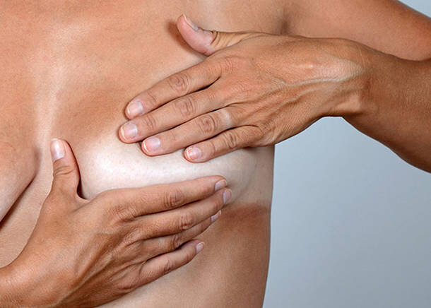 Почему болит грудь при климаксе?