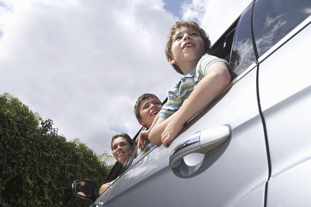 Leaning out of car