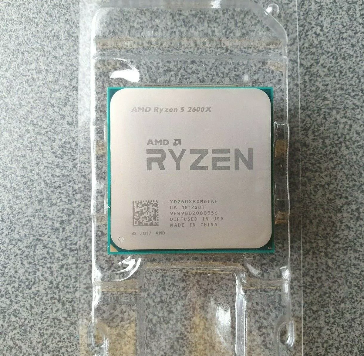 Процессор ryzen 2600 oem. АМД Рязань 5 2600. AMD Ryzen 5 2600x am4, 6 x 3600 МГЦ. Найден 5 2600 внутри.