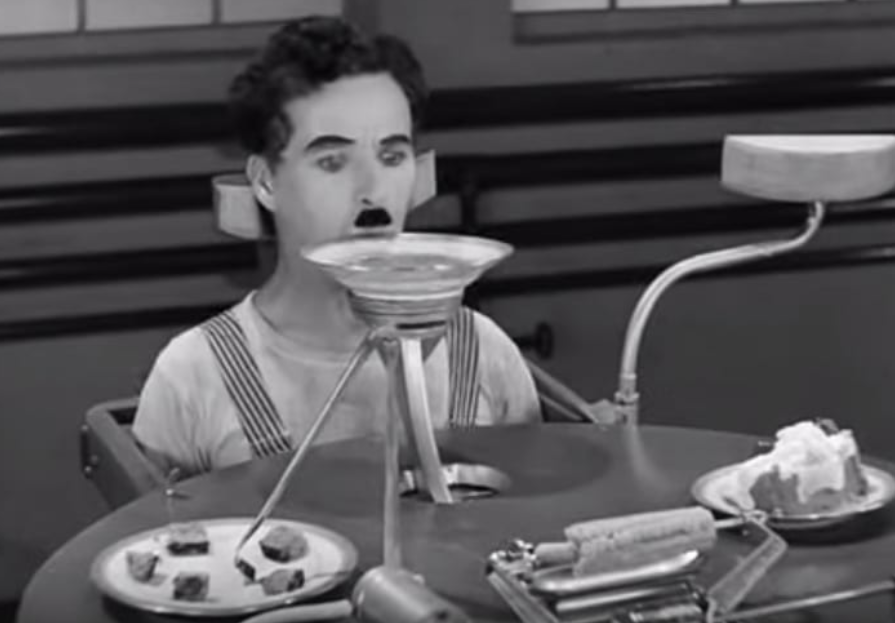  “Машина для кормления” Чарли Чаплина - культовый эпизод  фильма ​​«  Новые времена»  (1936).