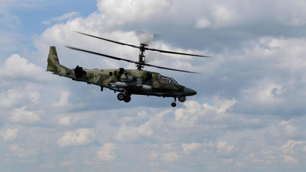   Ударные вертолеты Ка-52 ВКС России на аэродроме базирования в зоне проведения специальной военной операции на Украине© РИА Новости / Кирилл Нортон