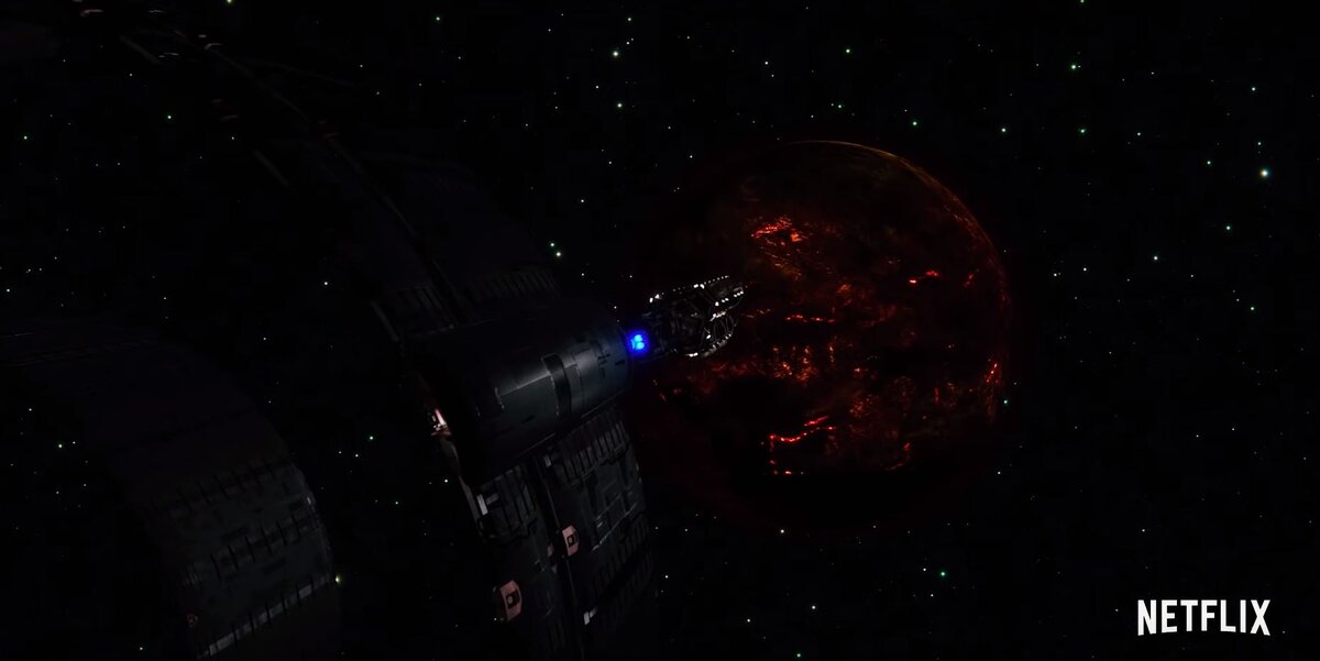 Небольшая часть экипажа опускается к раскалённой планете или спутнику. Кадр из трейлера.