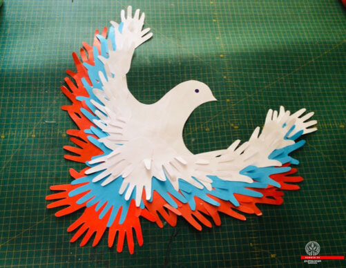 Взлетающий голубь в технике оригами