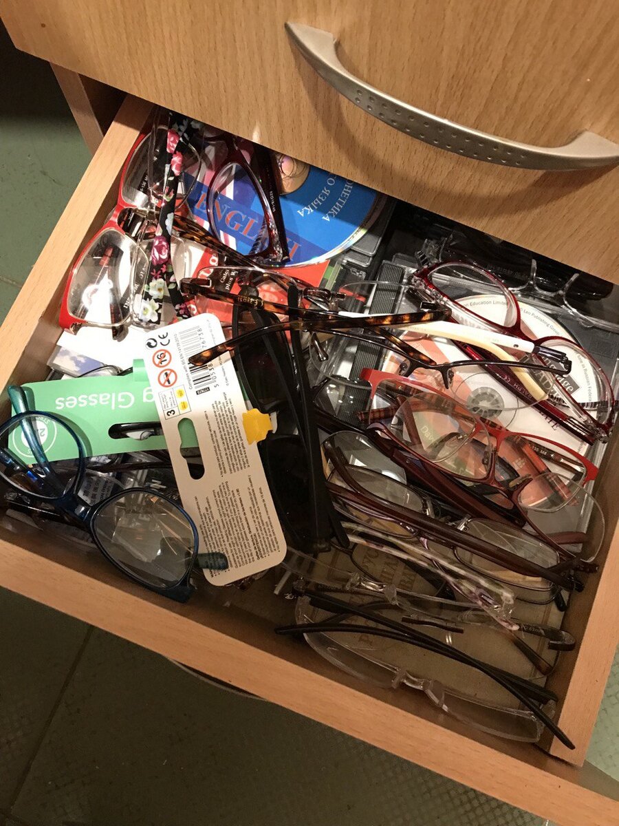 Dozens of pairs of glasses I have yet to try on