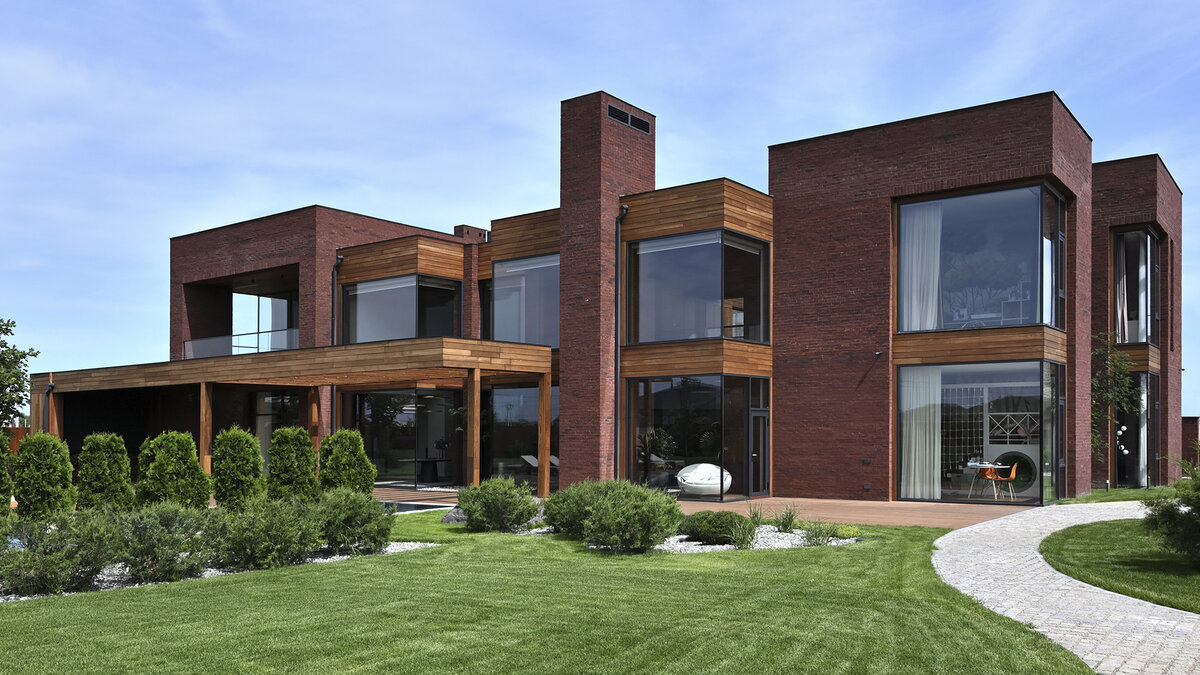 Дом из кирпича, дерева и стекла. Фото: архбюро Chado