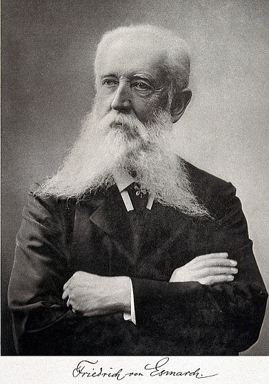 Иоганнес Фридрих Август фон Эсмарх (9 января 1823 - 23 февраля 1908) Фото с сайта https://wiki2.org/ru/%D0%AD%D1%81%D0%BC%D0%B0%D1%80%D1%85,_%D0%A4%D1%80%D0%B8%D0%B4%D1%80%D0%B8%D1%85_%D0%90%D0%B2%D0%B3%D1%83%D1%81%D1%82_%D1%84%D0%BE%D0%BD 