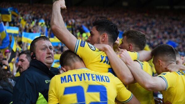    Футболисты сборной Украины© AFP 2022 / ANDY BUCHANAN