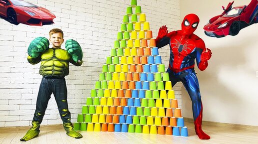 Mark and Superheroes knock down Giant pyramids from colored cups