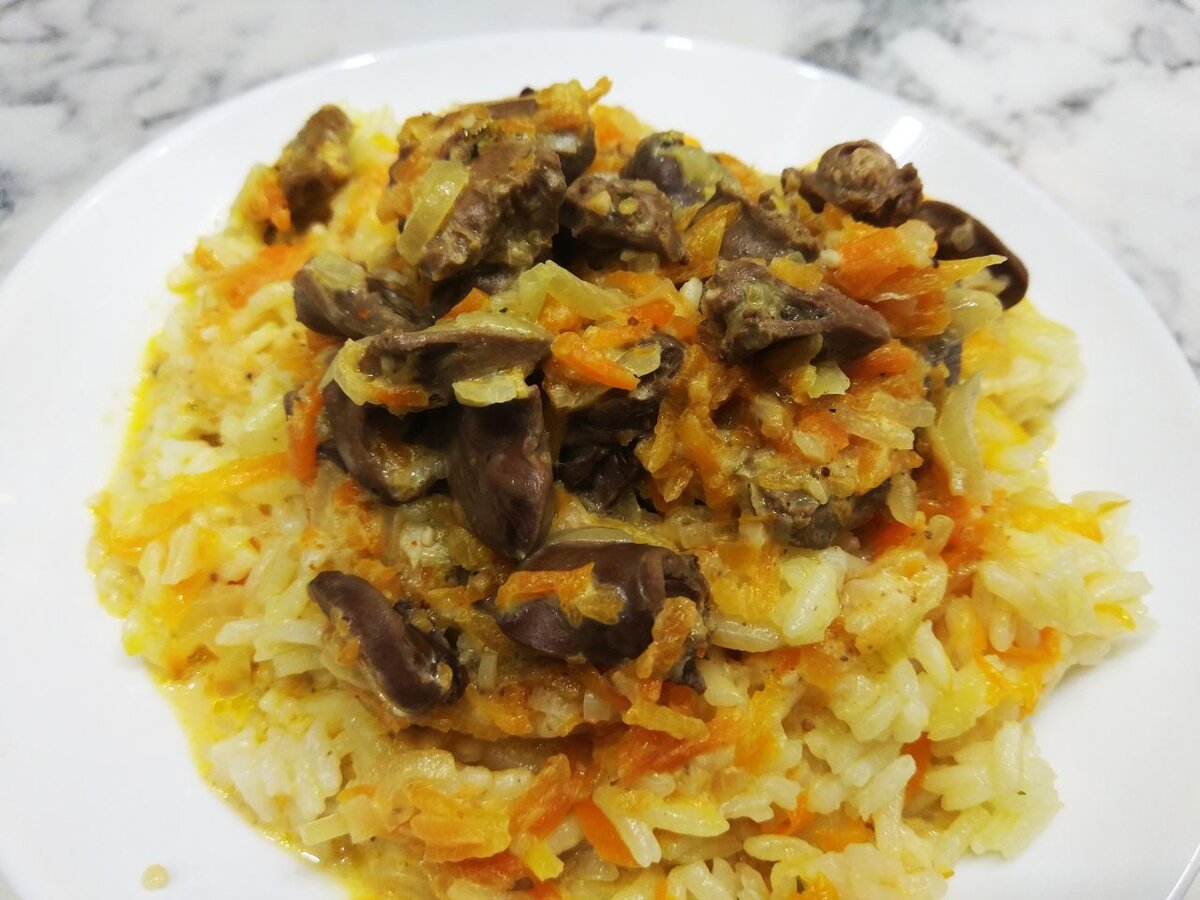 Плов с куриными сердечками