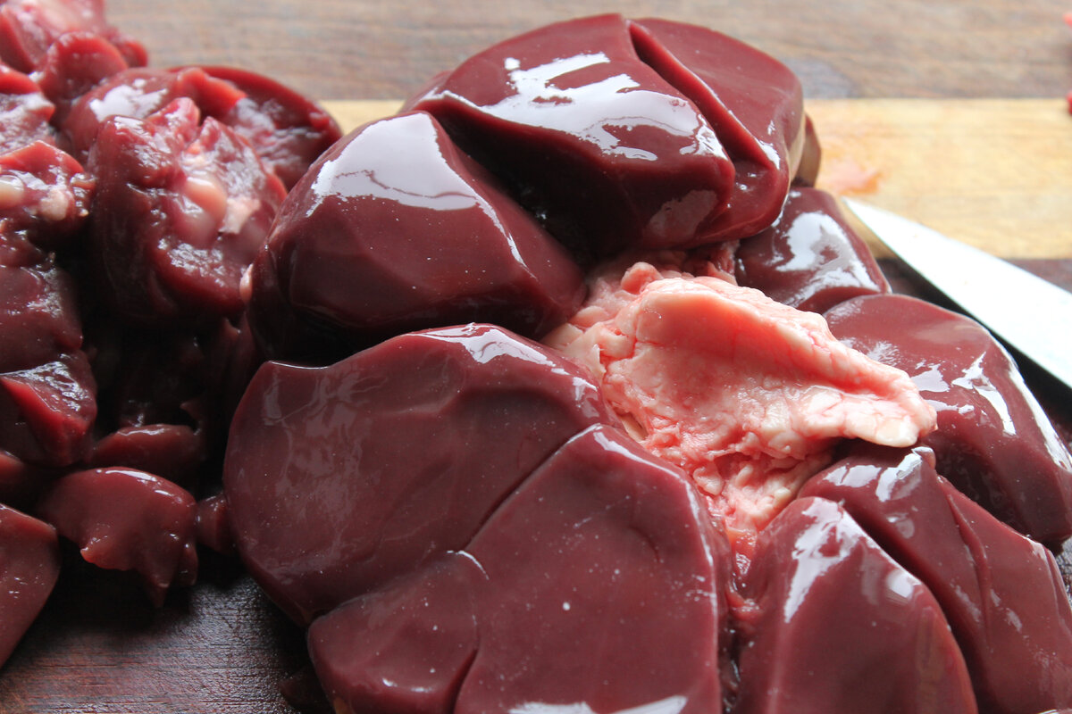 Two Beef Kidneys Raw Isolated on White Background. Close Up. Cow Kidney Isolated