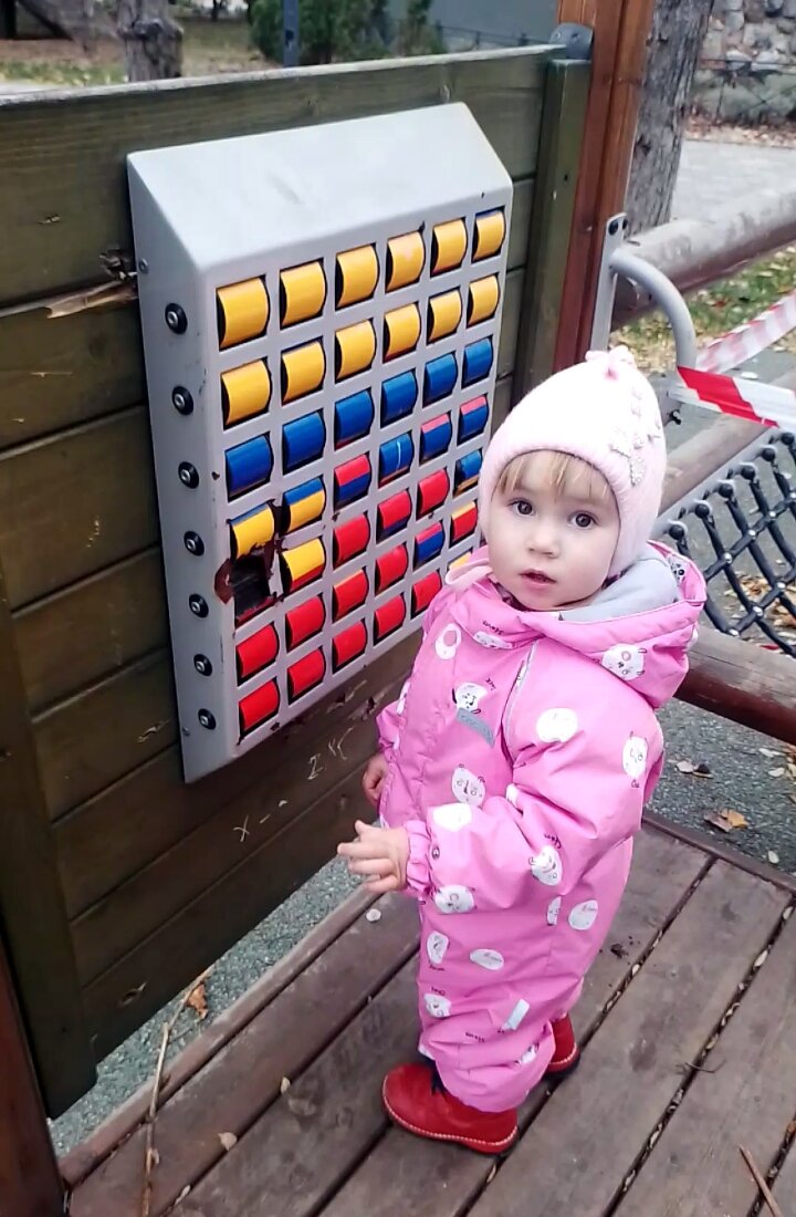Моя вторая "кровиночка" играется на полуразрушенной детской площадке.